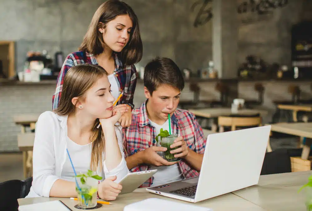 students using laptop for education